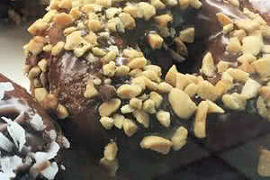 Chocolate Glaze Chopped Peanuts Donut