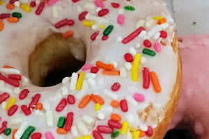 Vanilla Glazed Sprinkles Donut